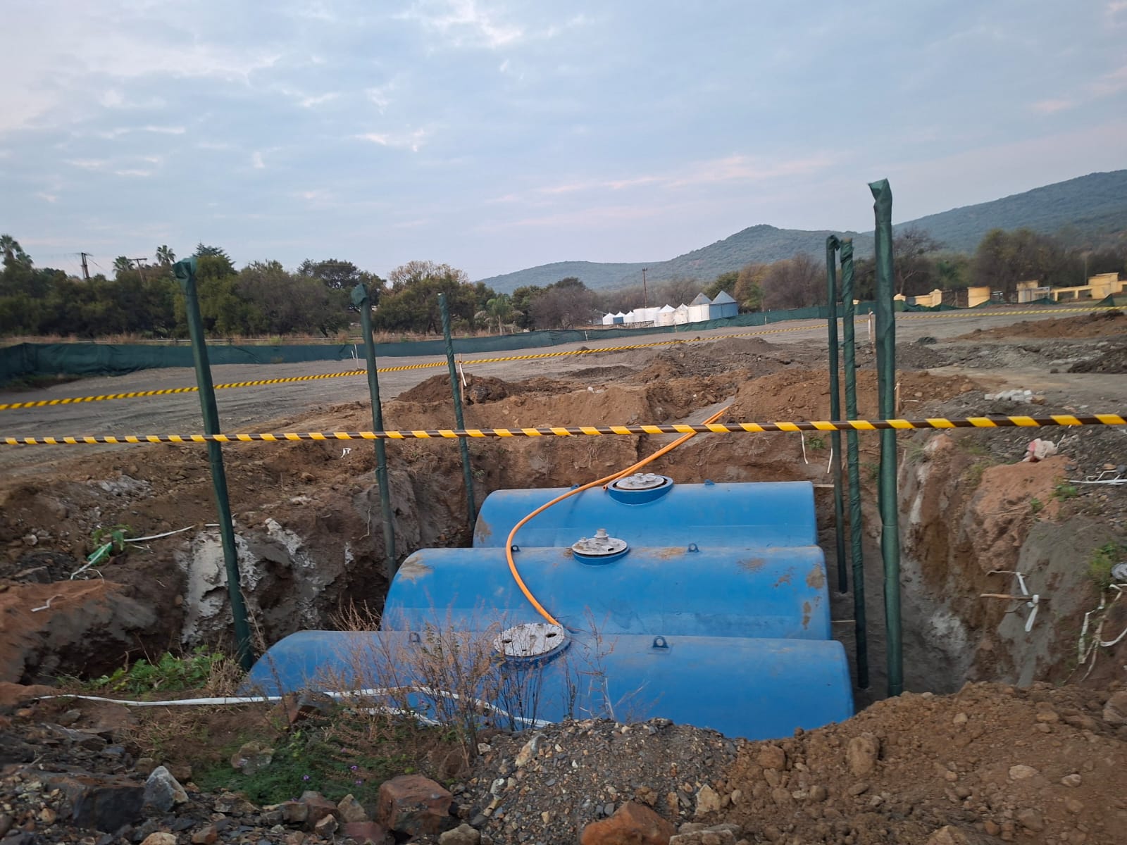 Underground storage tanks being installed